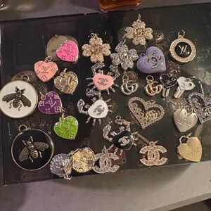 Zipper pull pendants stamped